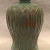Stoneware Mei Ping (Plum Blossom) shaped vase with carved fluted exterior.