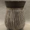 Black Raven Clay Stoneware vase with slit exterior, white glaze
