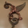 Hand forged steel frog on banana leaf, painted, distressed.